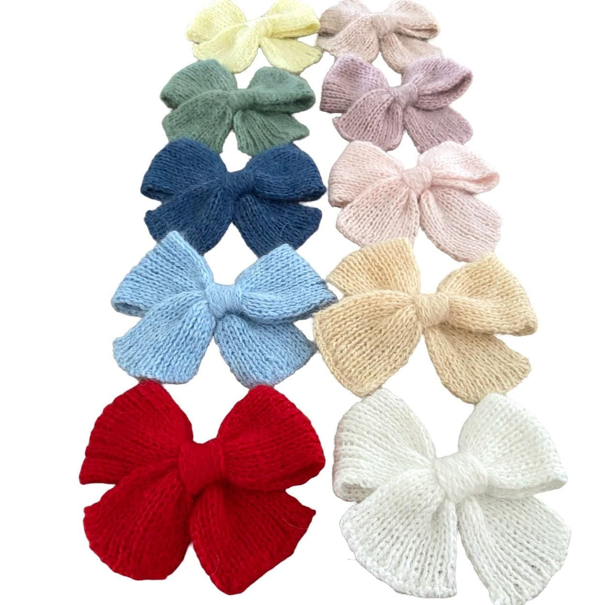 Handmade knit angora alpaca baby/children hair bows.