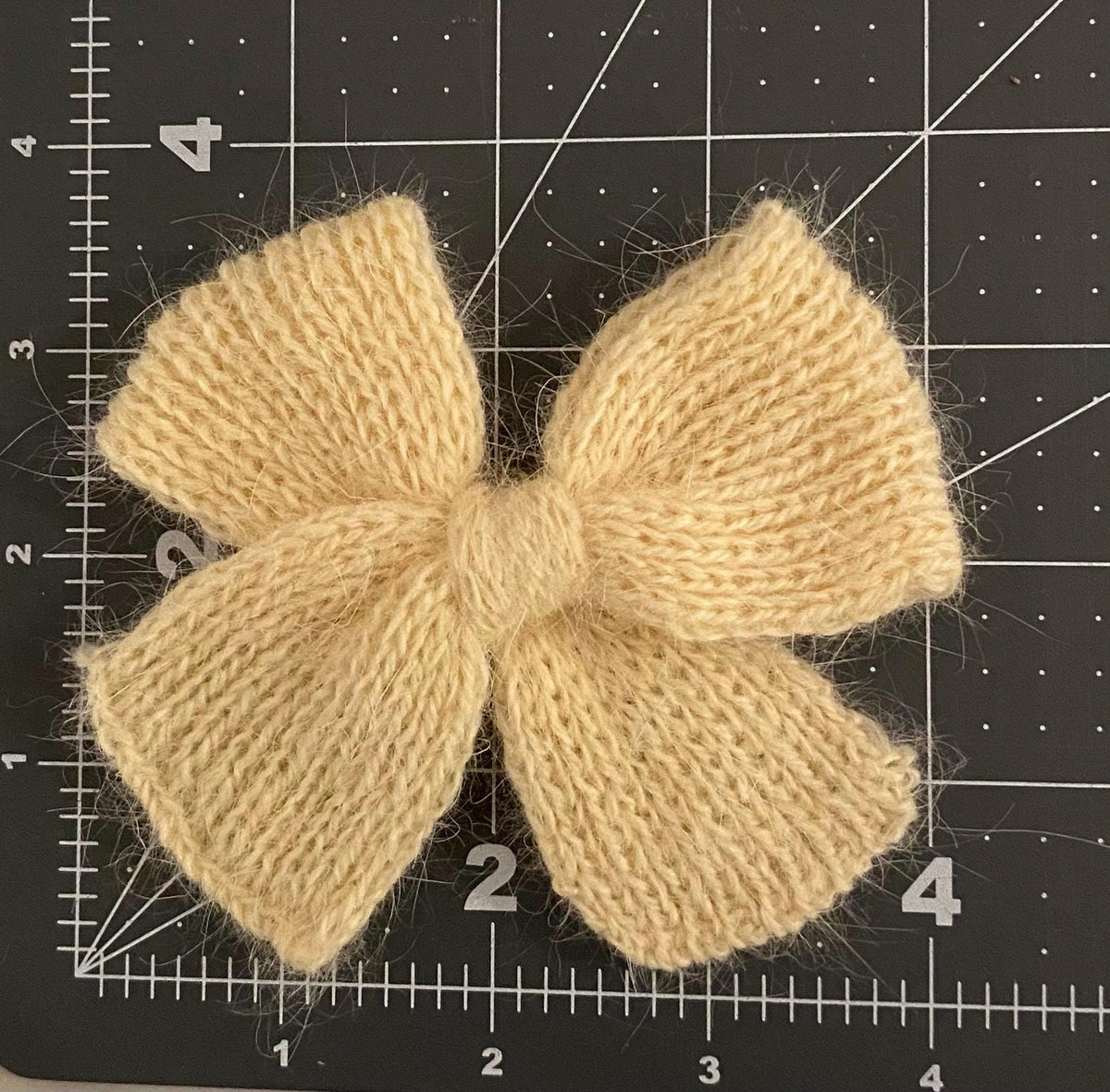 Handmade knit angora alpaca baby/children hair bows.